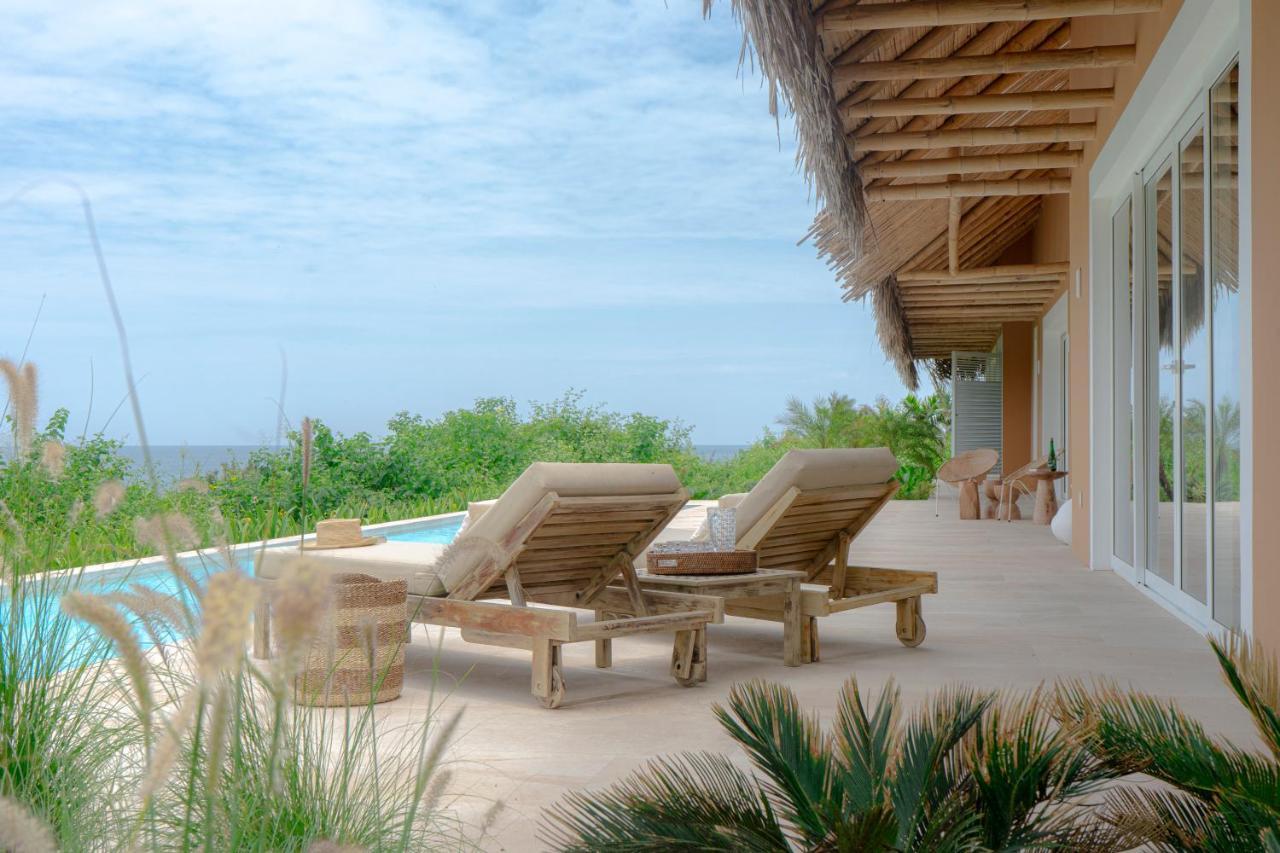 Tanusas Retreat & Spa Hotell Puerto Cayo Eksteriør bilde